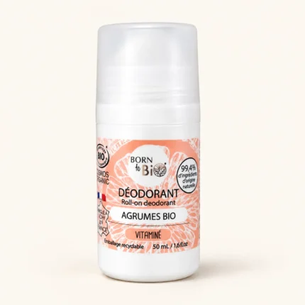 Déodorant bio Agrumes Born To Bio roll-on 50 ml sur fond beige