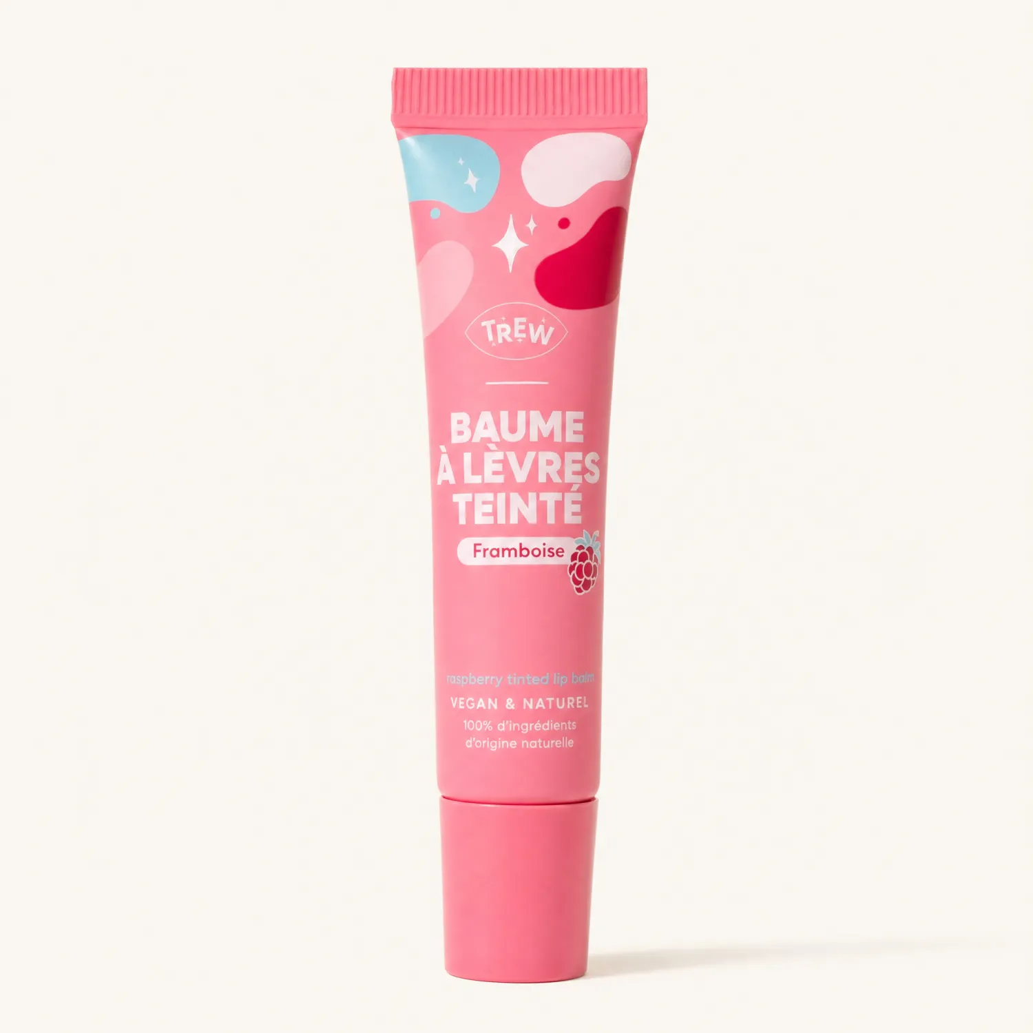 Tube rose Baume à Lèvres Teinté Framboise TREW fond beige